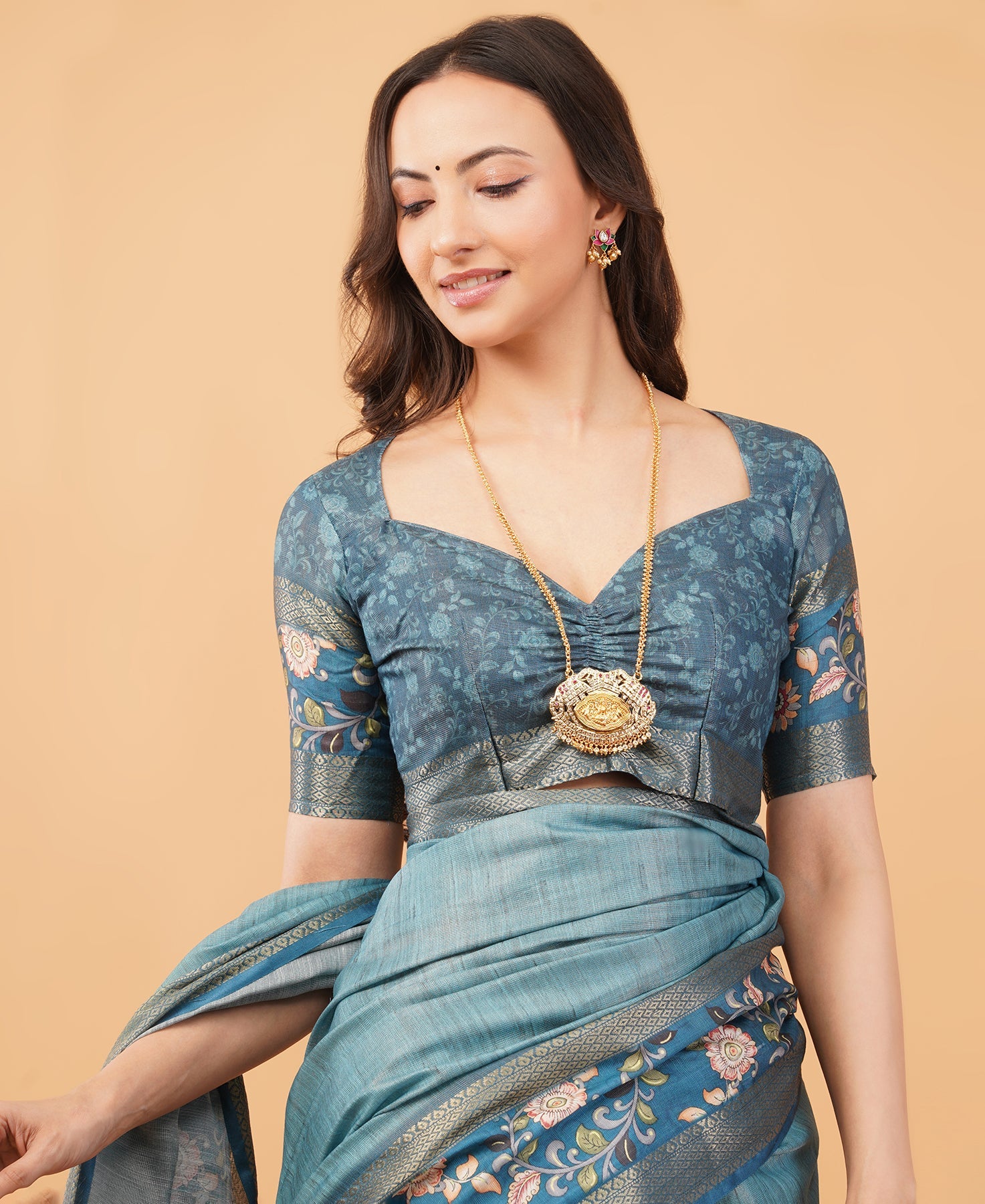 Teal Blue Textured Saree with Kalamkari Floral Border & Ruched Blouse