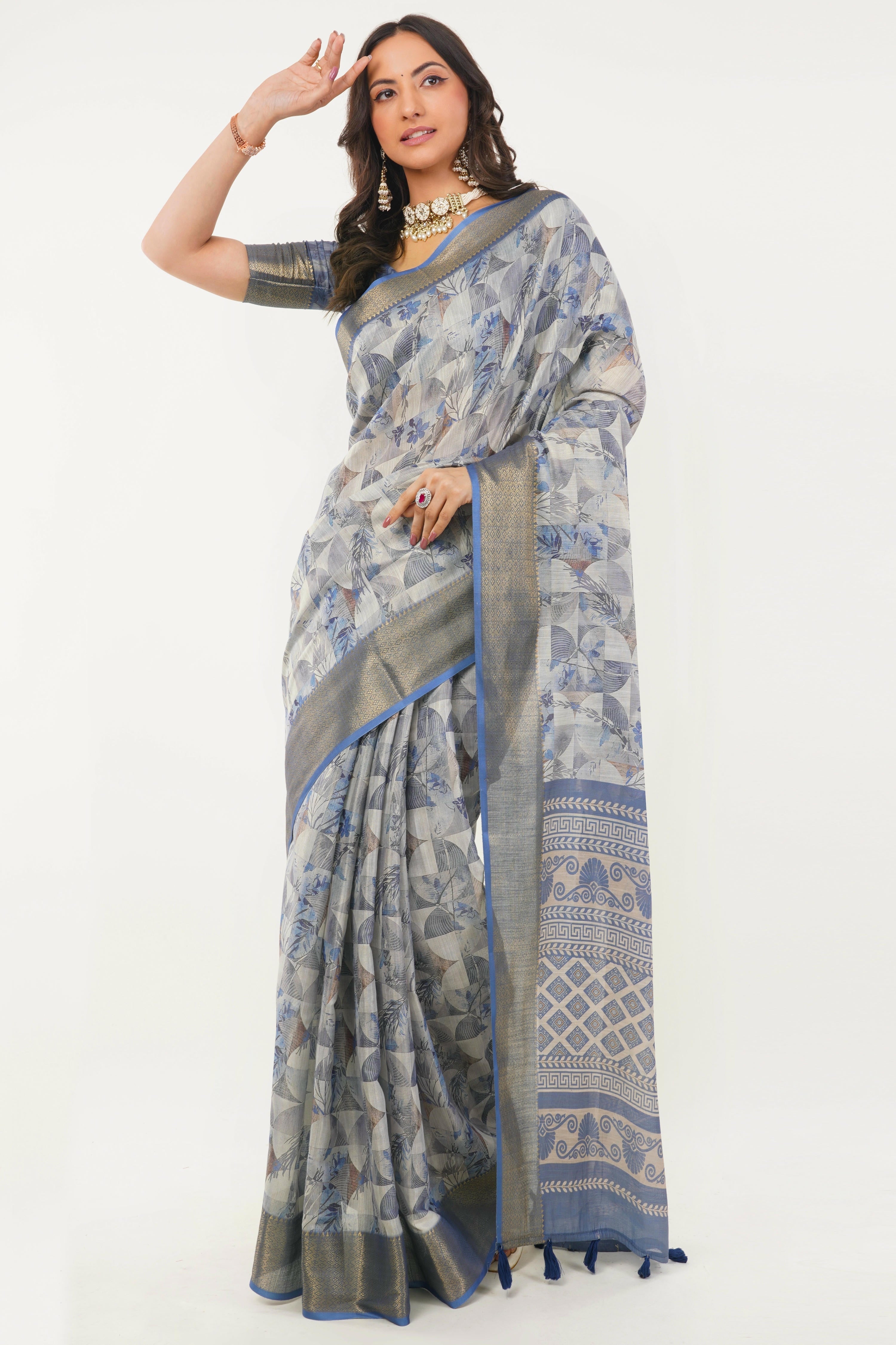 Cool grey and indigo geometric print saree with antique zari border, tassel pallu and ruched blouse