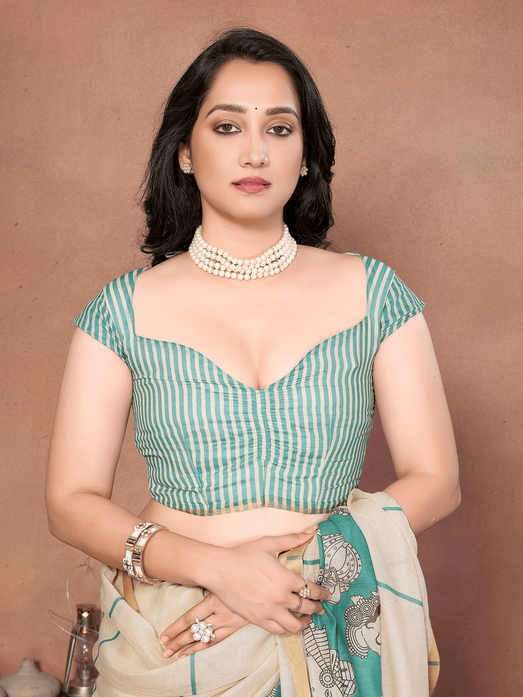 Cream & Sea-Green Kathakali Print Linen-Look Saree with Gold Zari Border and Ruched Blouse