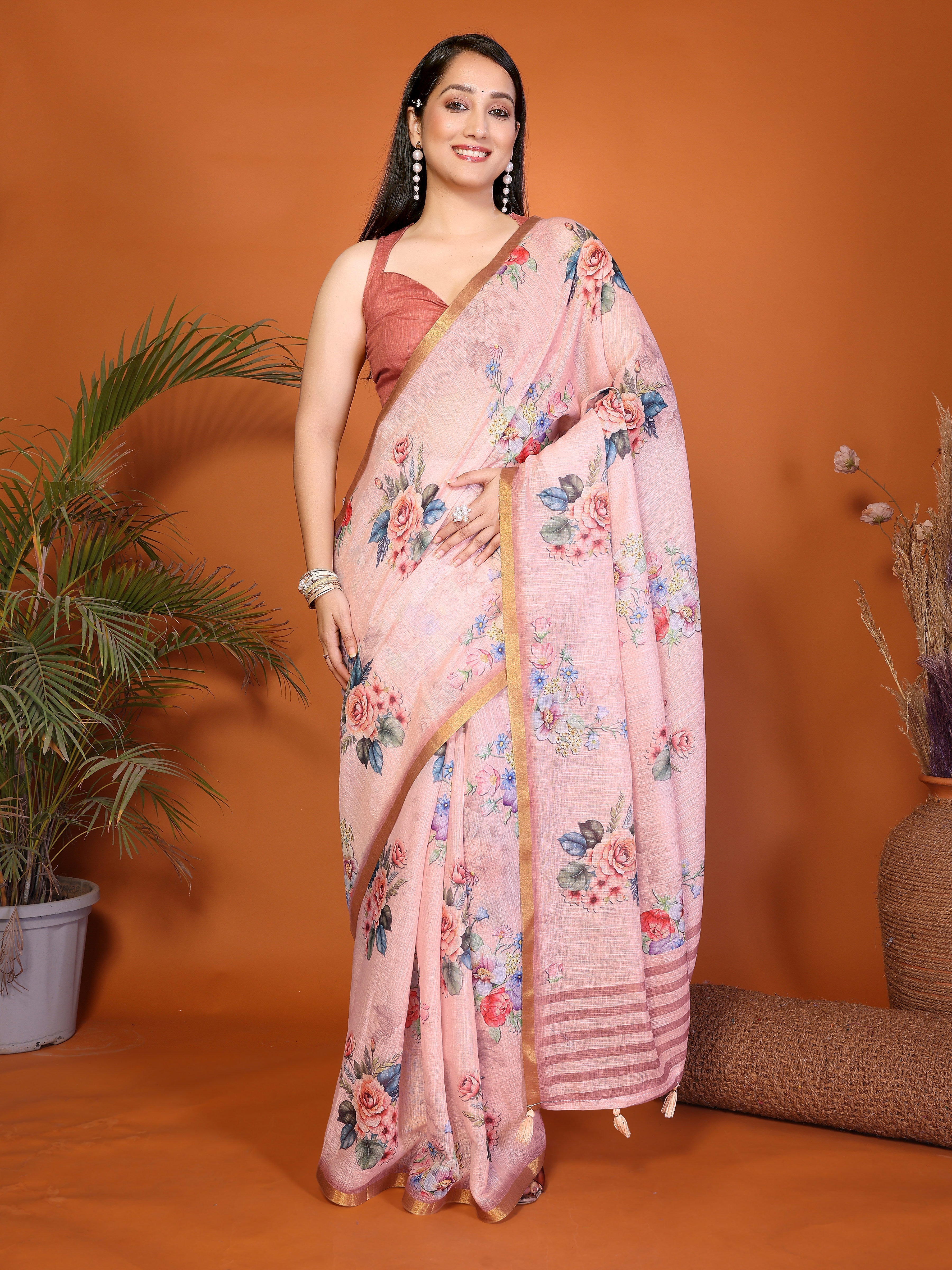 Pink floral ready-to-wear saree with gold border, tassels and side pocket