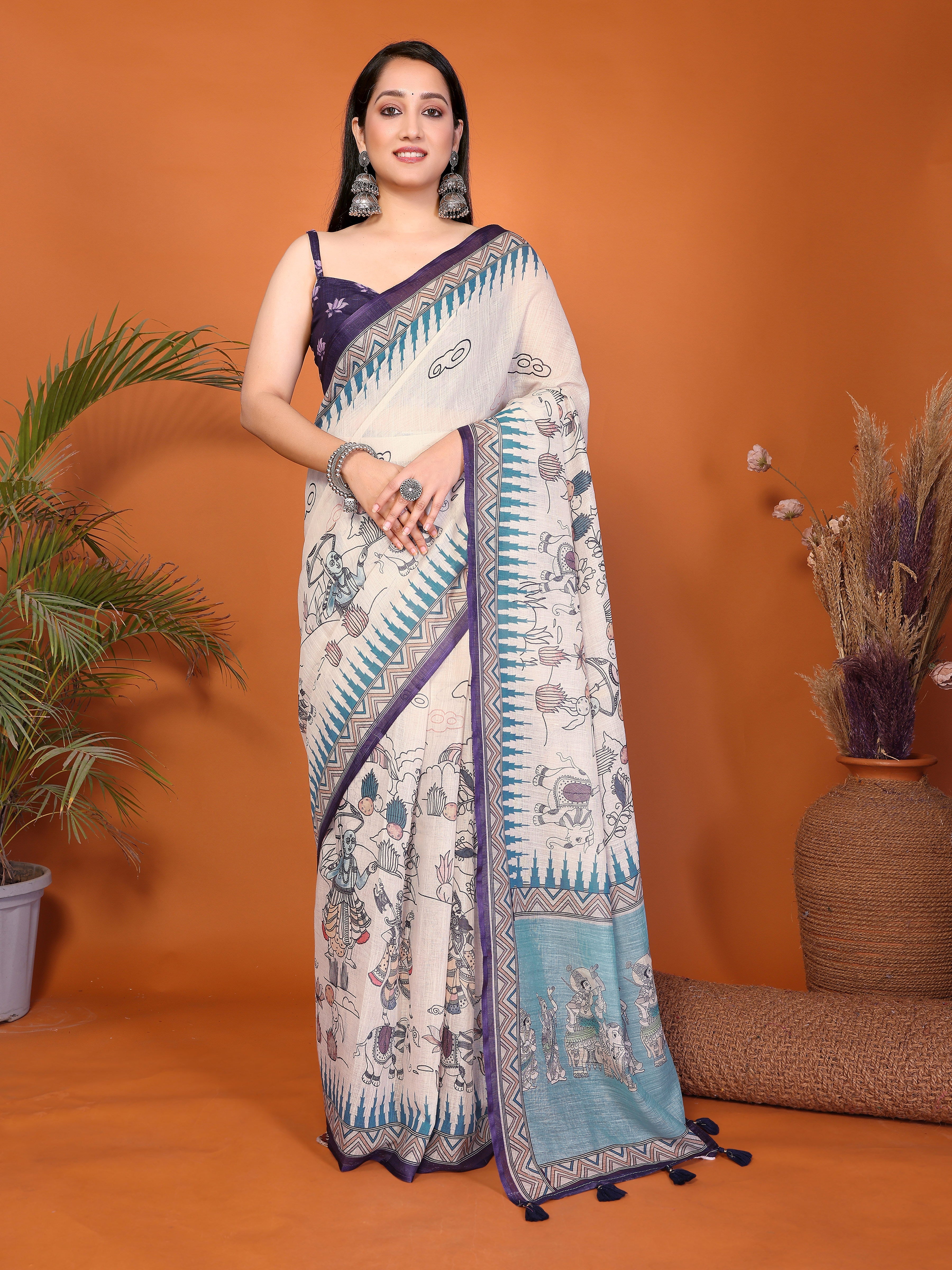 Off-white Pattachitra print ready-to-wear saree with teal pallu, pocket and purple blouse