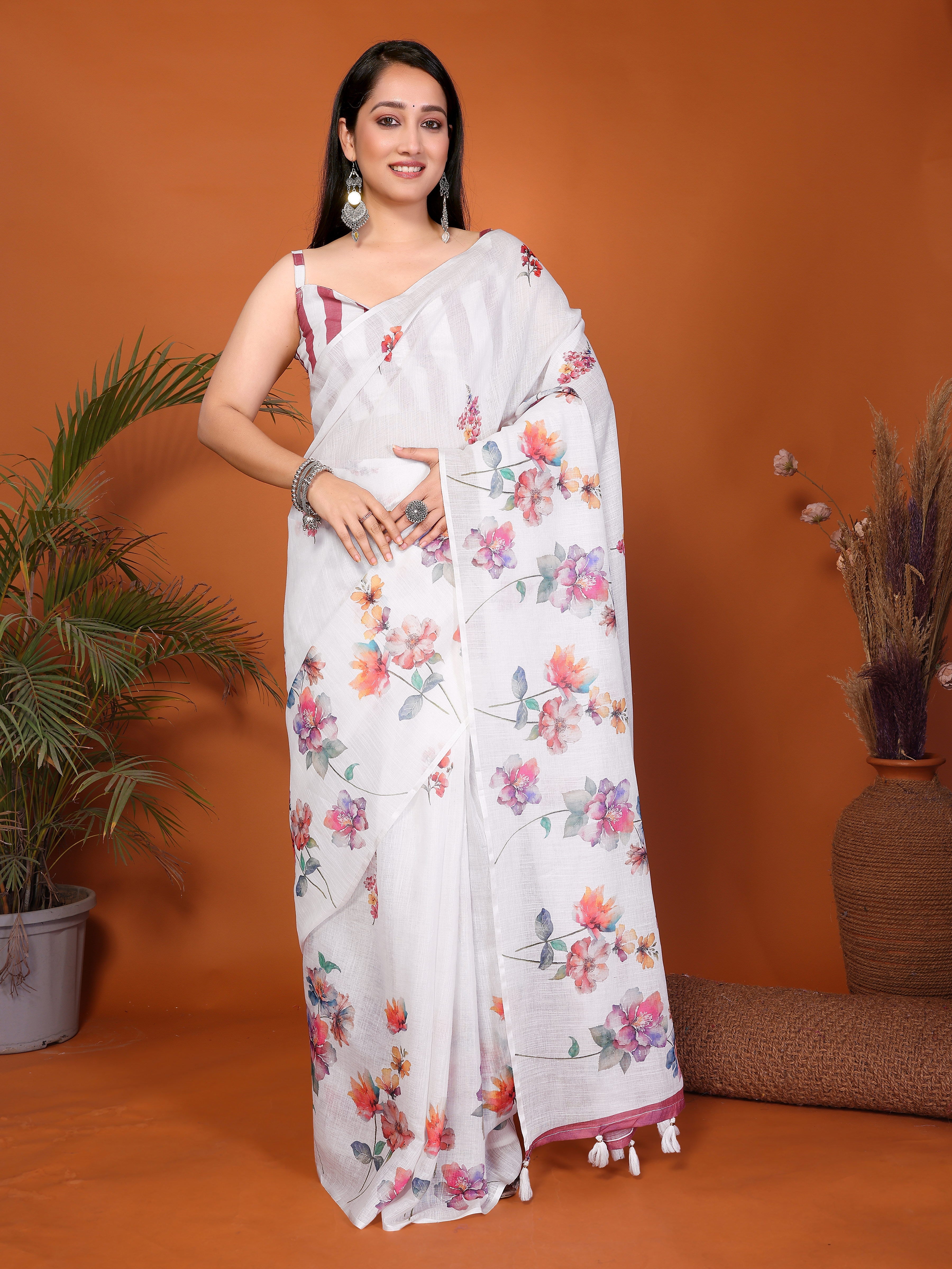 Off-white floral ready-to-wear saree with maroon border, tassels and side pocket
