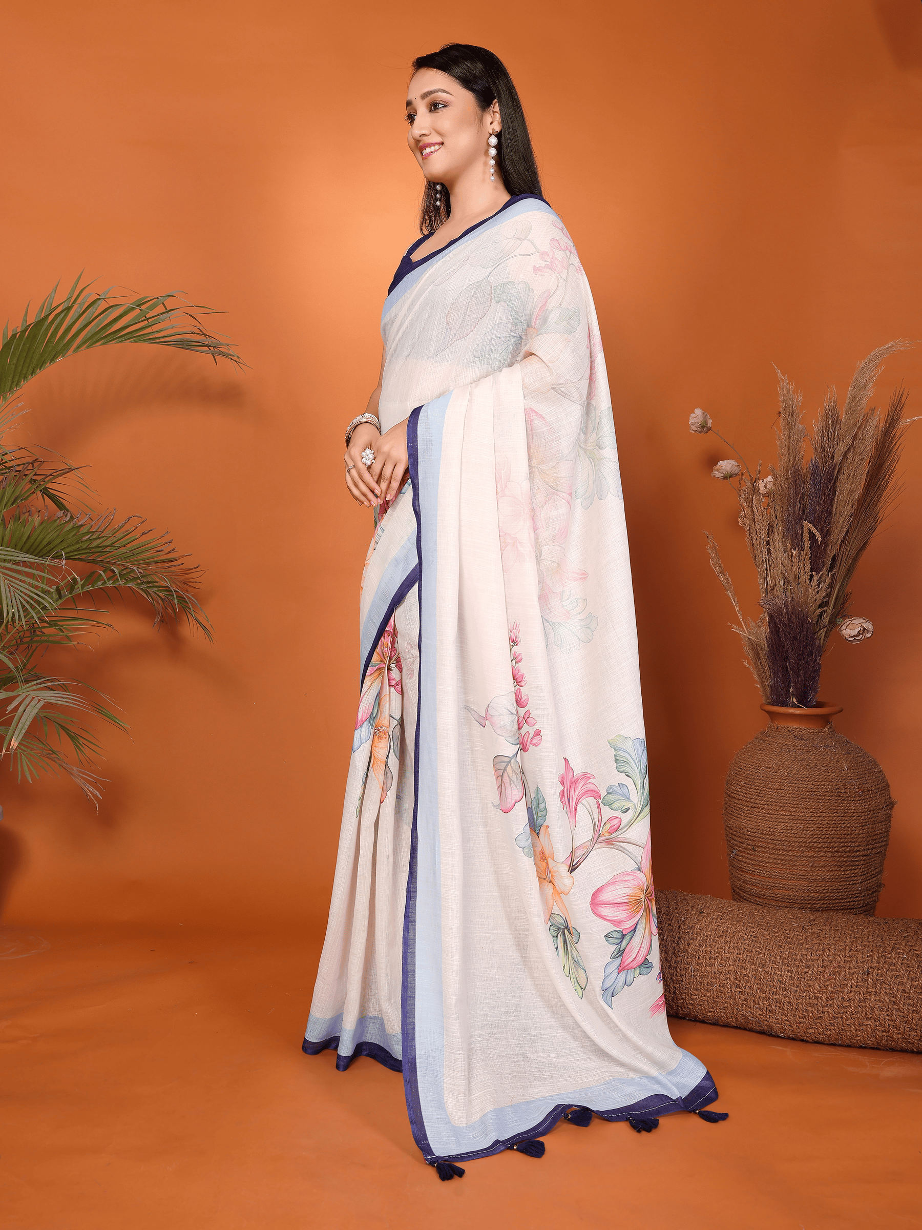 Cream White Floral Ready-to-Wear Saree with Blue Border, Pocket and Tassels