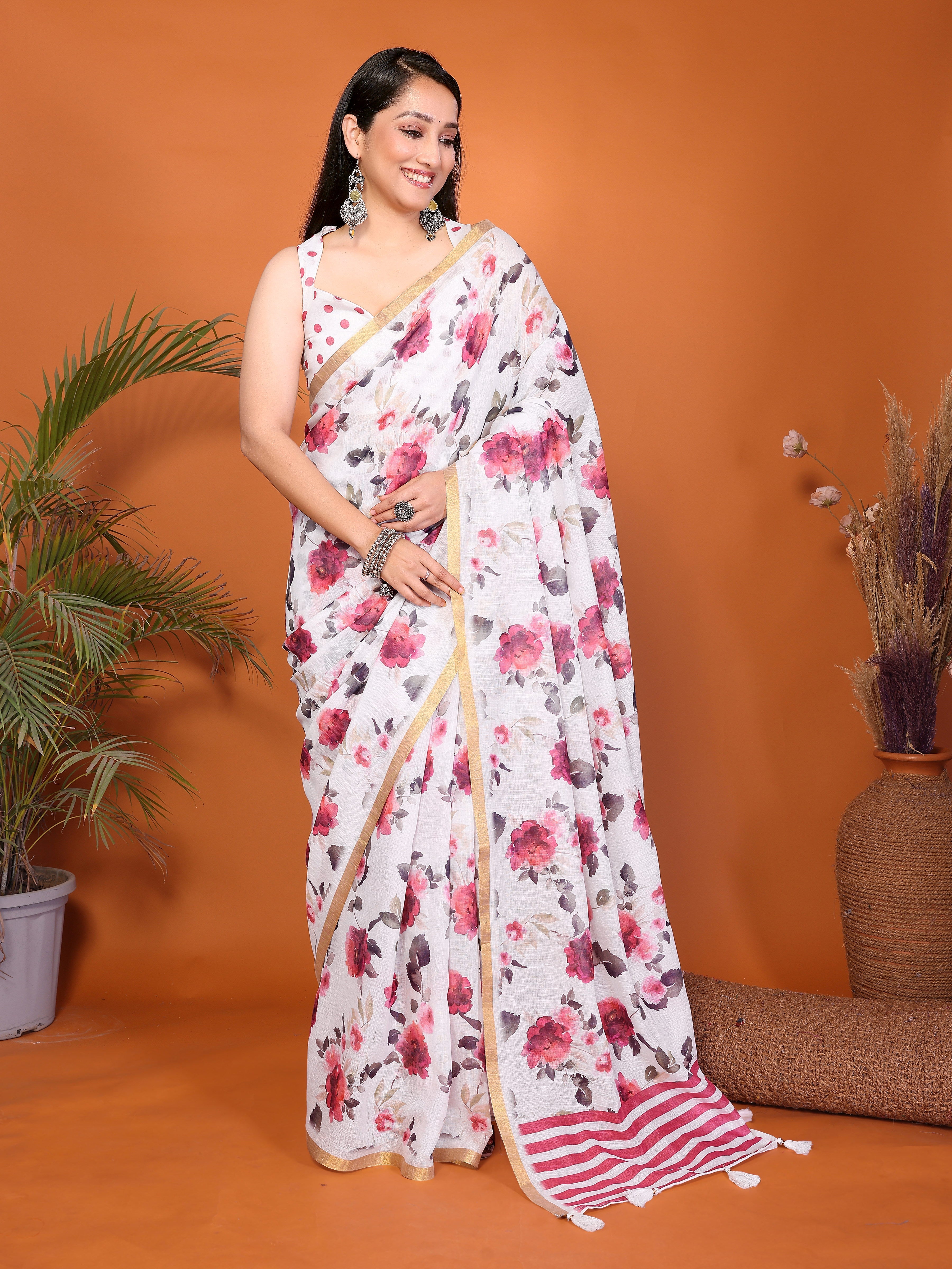 White and pink floral ready-to-wear saree with striped pallu, tassels and side pocket