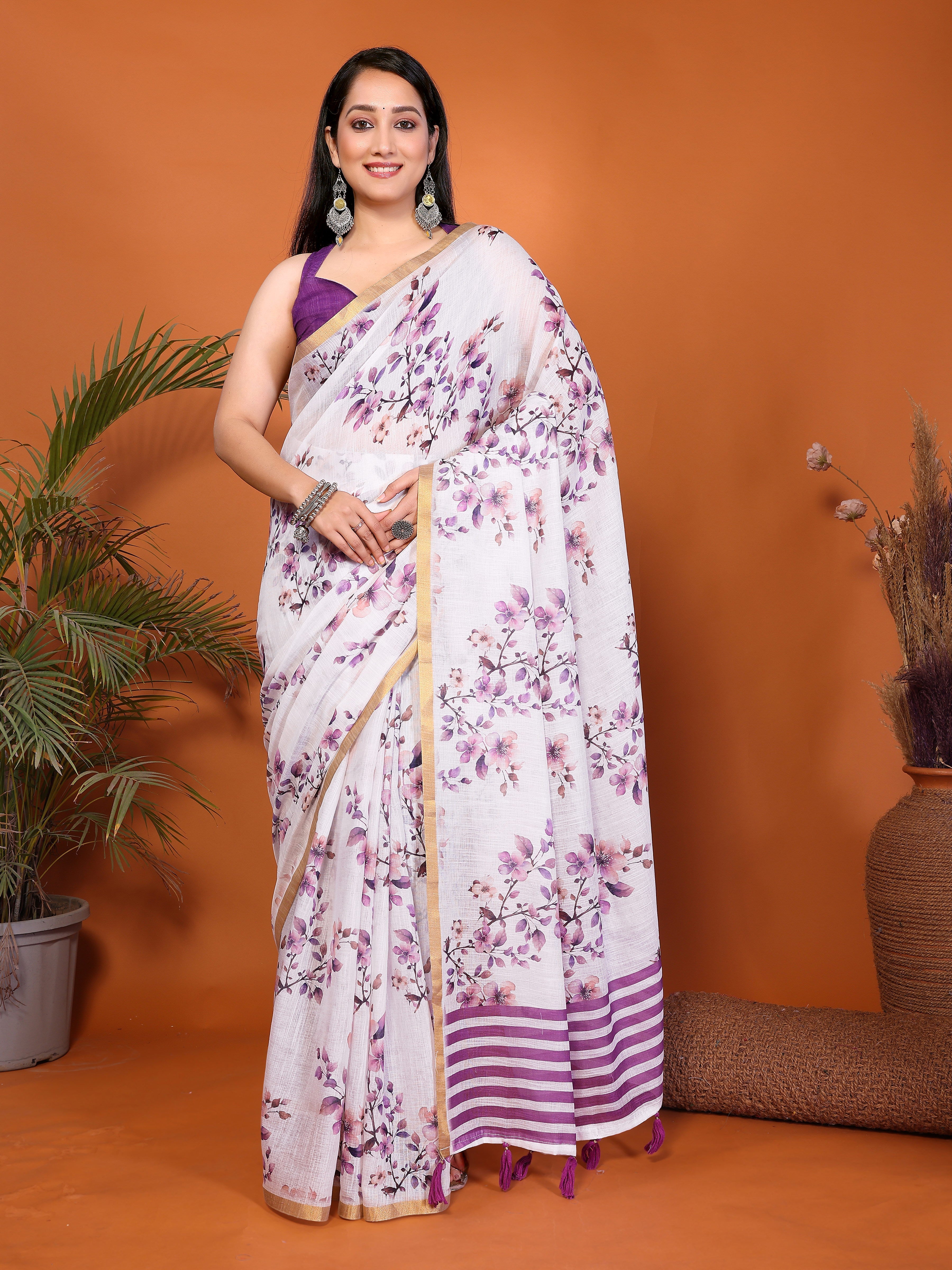 Purple floral ready-to-wear saree with striped pallu, tassels and side pocket