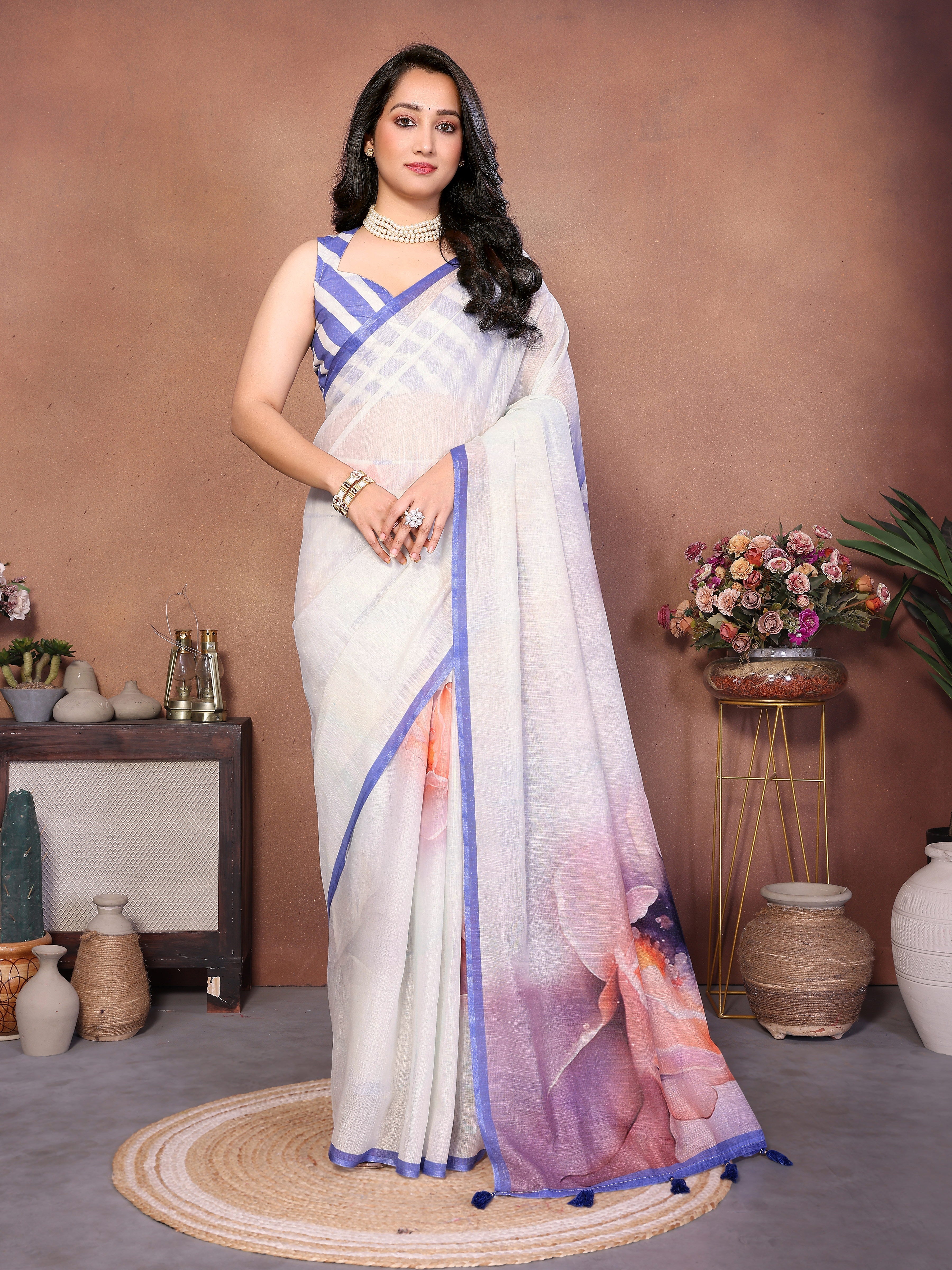 White floral print ready-to-wear saree with blue striped blouse and side pocket