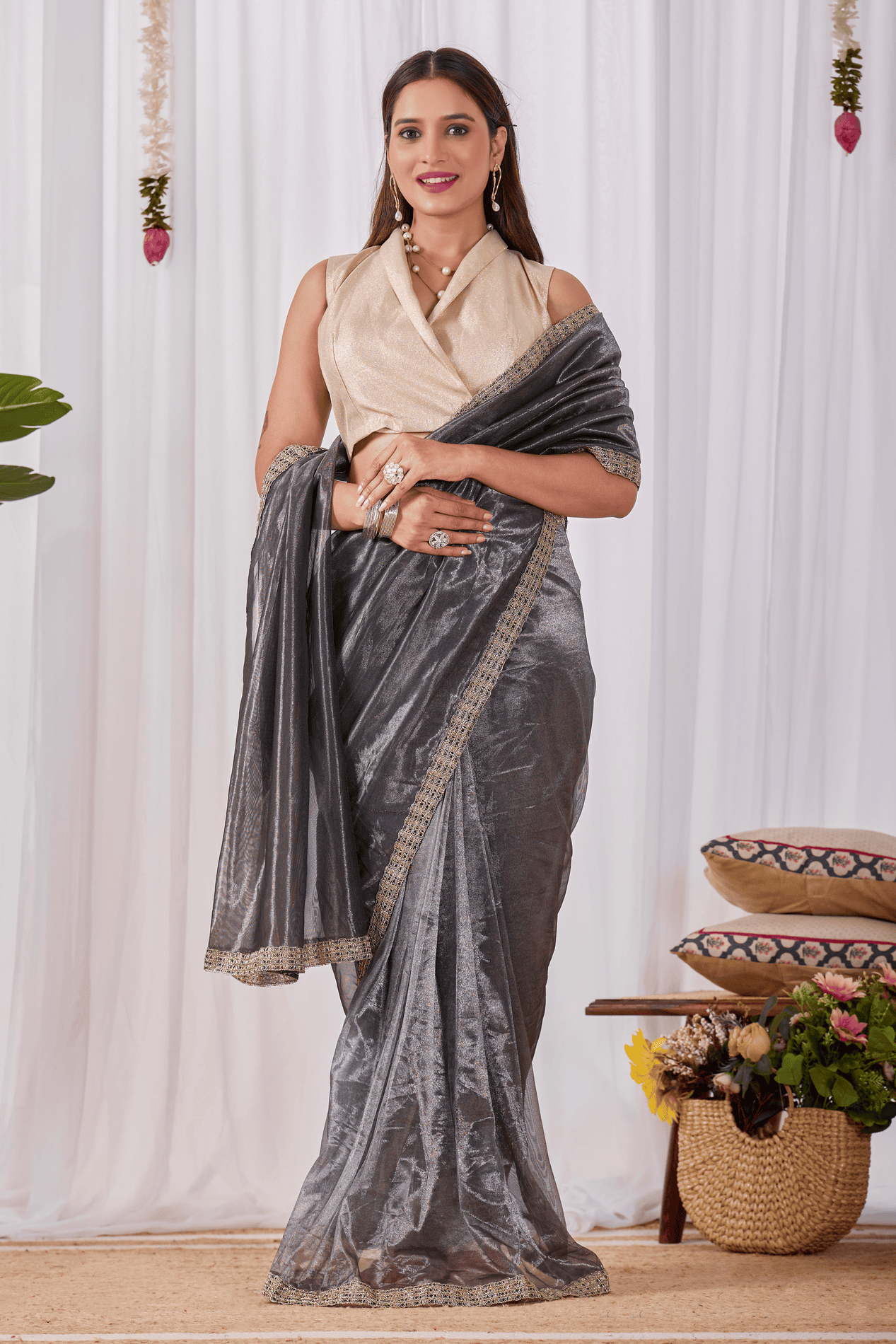 Charcoal grey ready-to-wear shimmer saree with gold sequin border and champagne wrap blouse