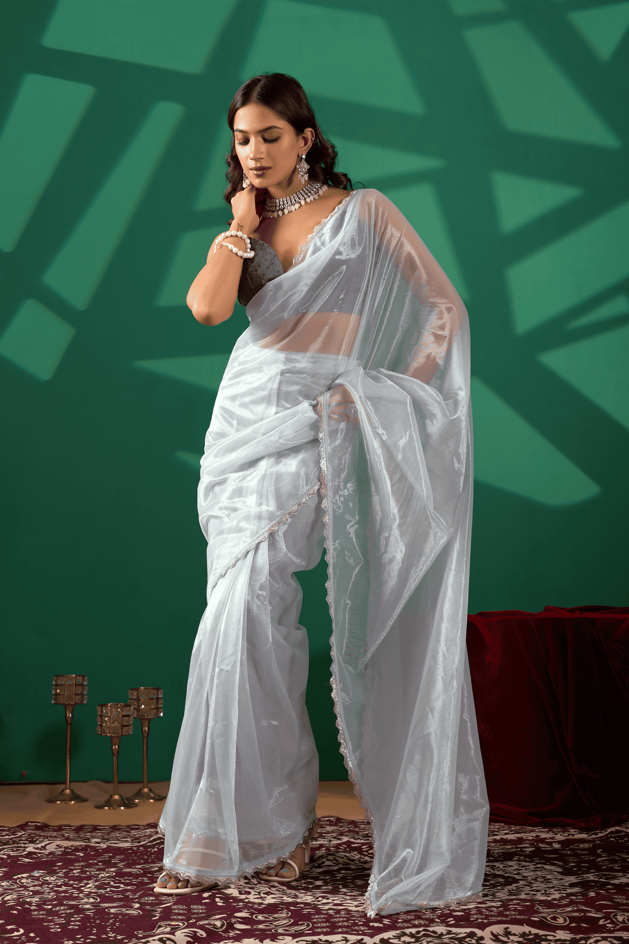 Sky blue shimmer ready-to-wear saree with silver sequin scalloped border and sleeveless embellished blouse