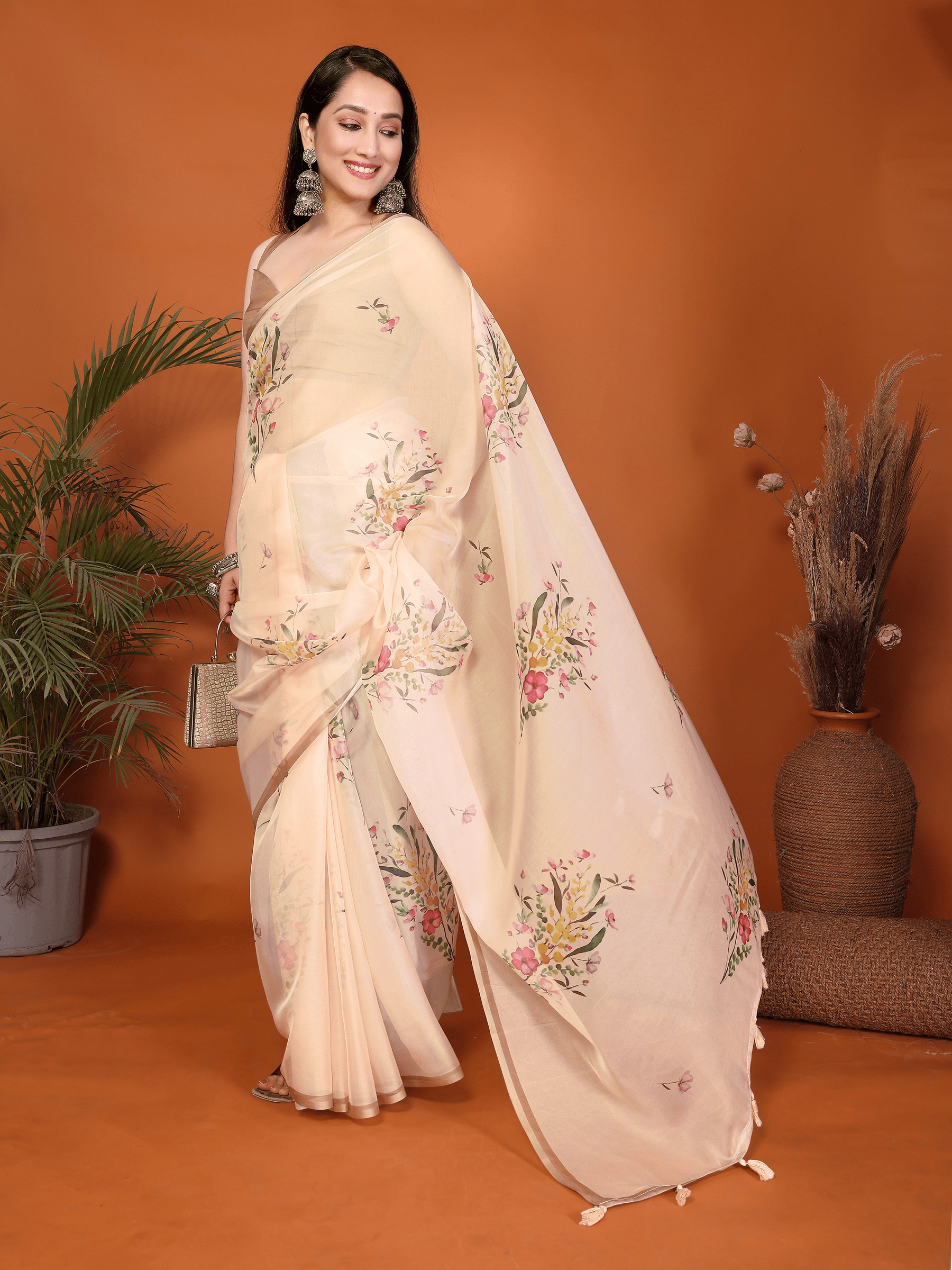 Sandalwood Peach Floral Print Saree with Metallic Border and Ruched Bronze Blouse