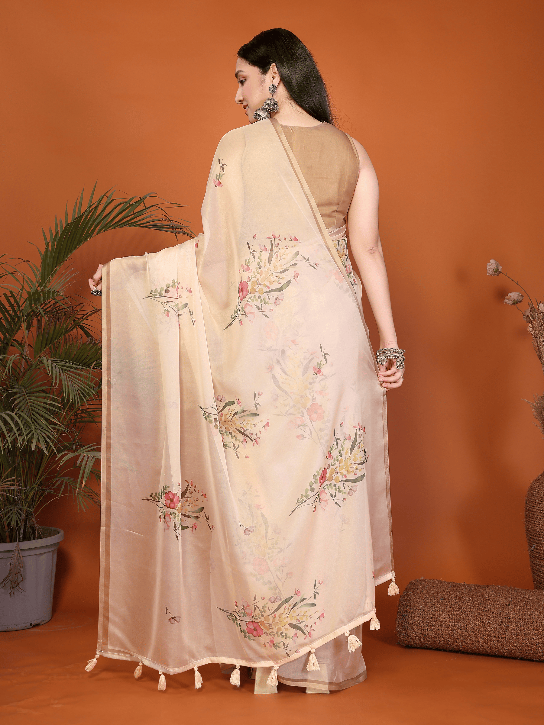 Sandalwood Peach Floral Print Saree with Metallic Border and Ruched Bronze Blouse