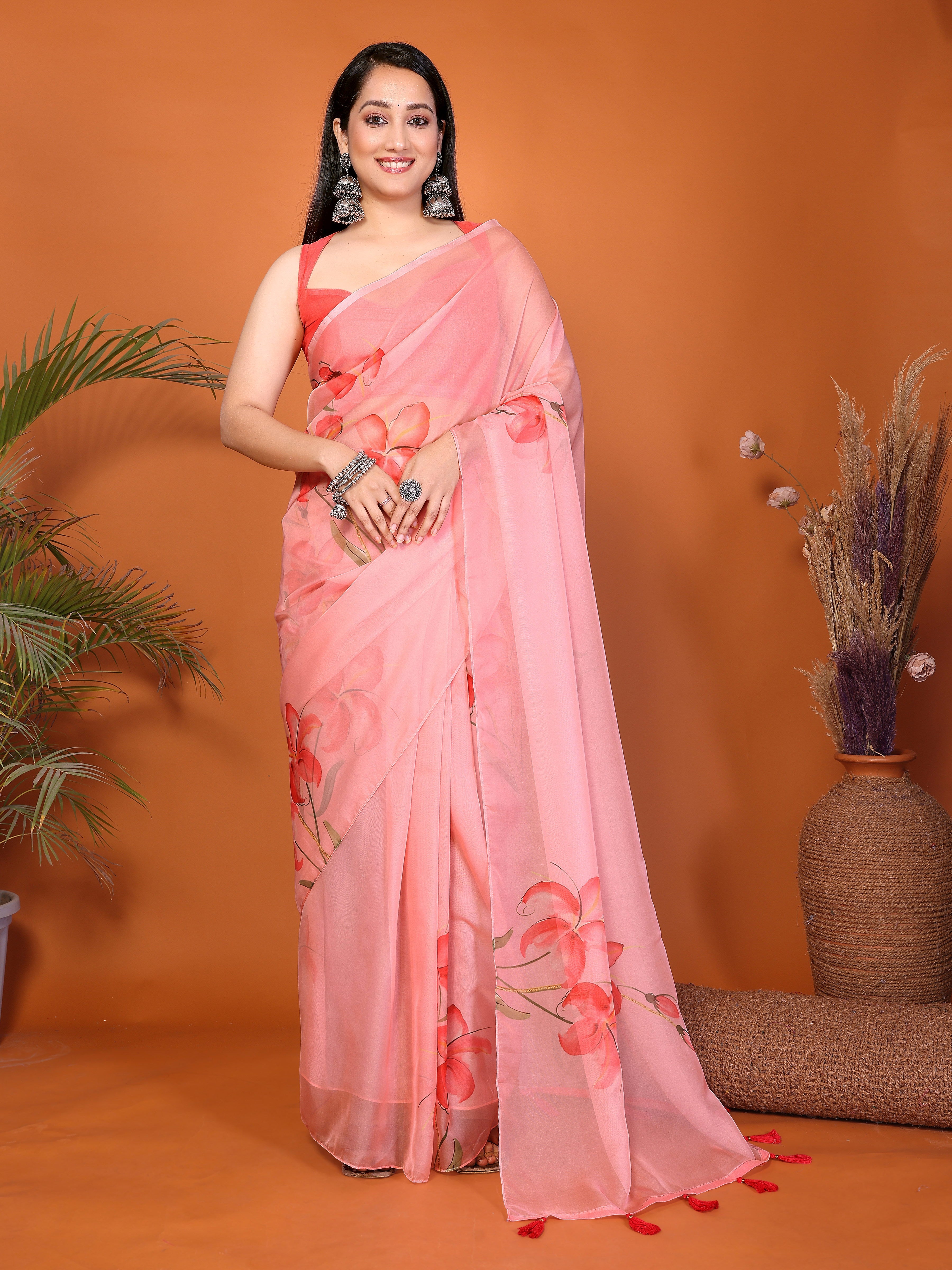 Peach floral ready-to-wear saree with stitched pleats, side pocket and tassel pallu