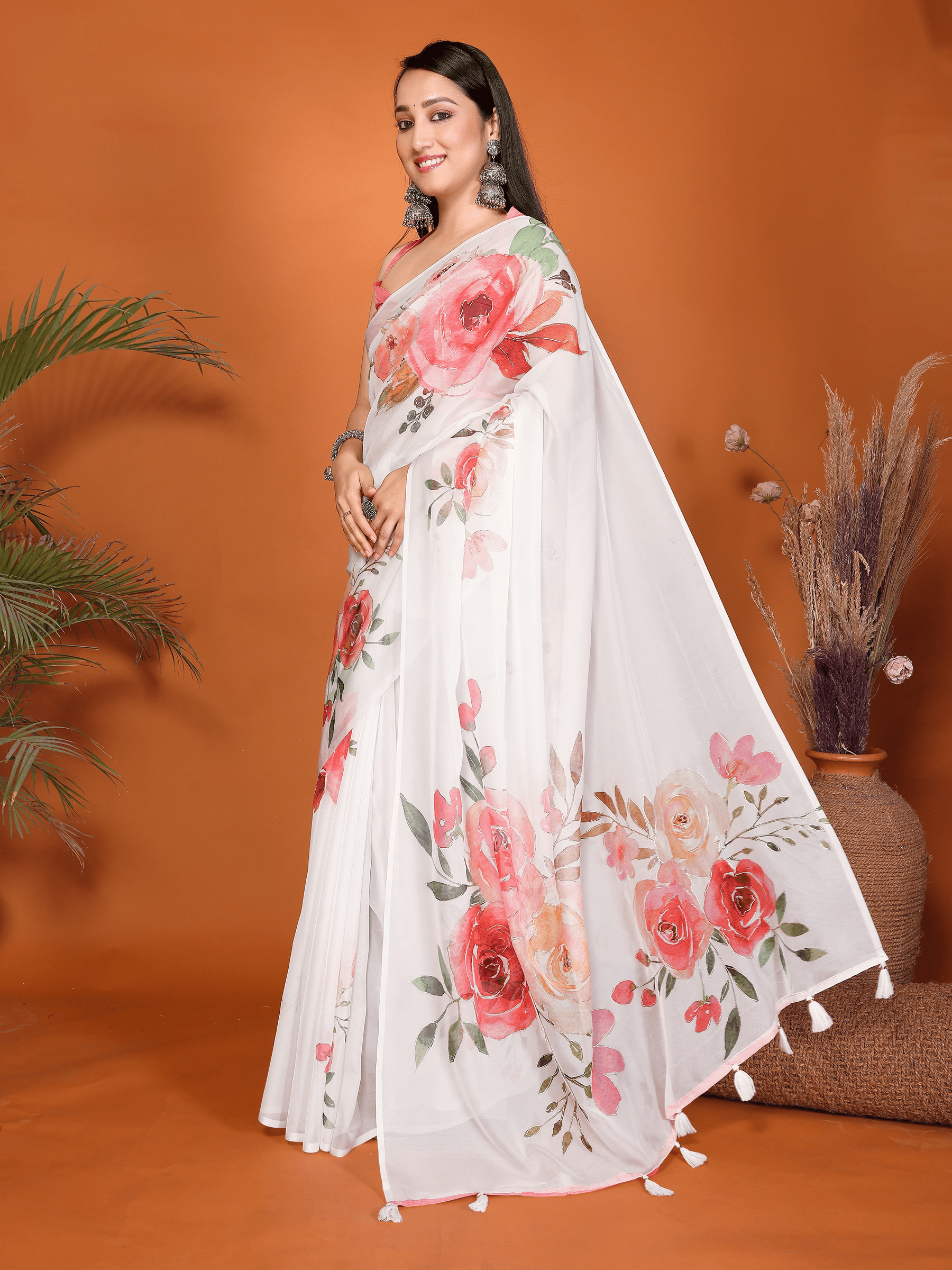 White Floral Print Saree with Pink Rose Motifs and Ruched Sleeveless Blouse