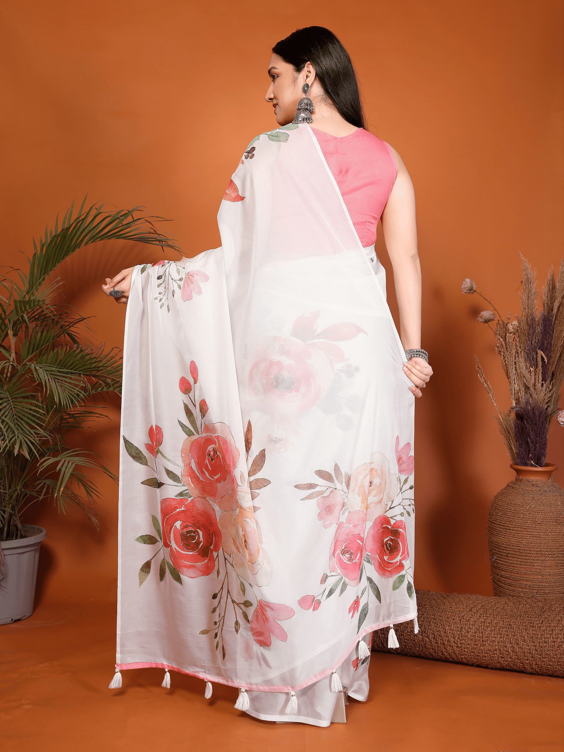White Floral Print Saree with Pink Rose Motifs and Ruched Sleeveless Blouse