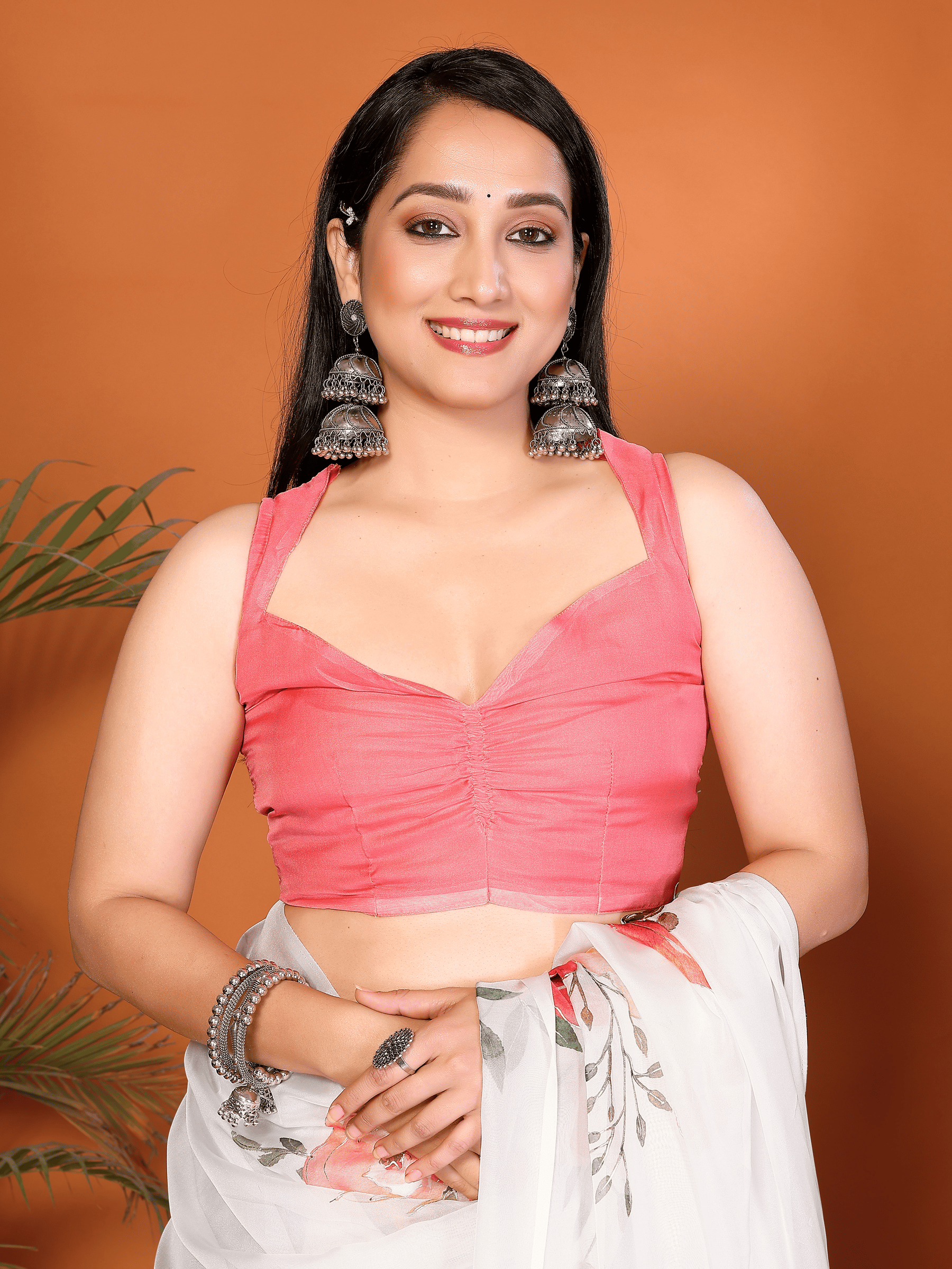 White Floral Print Saree with Pink Rose Motifs and Ruched Sleeveless Blouse