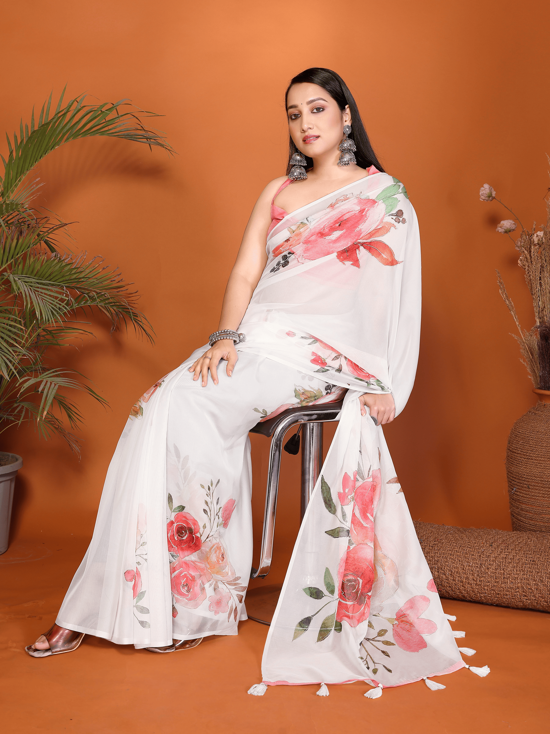 White Floral Print Saree with Pink Rose Motifs and Ruched Sleeveless Blouse