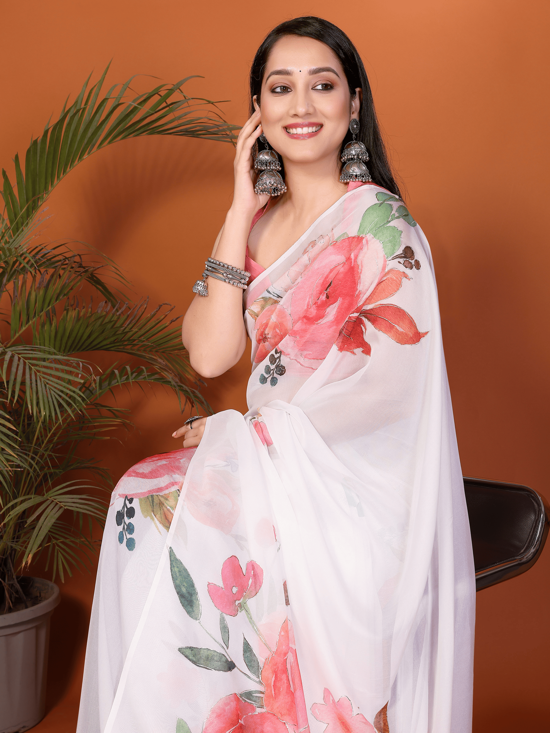 White Floral Print Saree with Pink Rose Motifs and Ruched Sleeveless Blouse