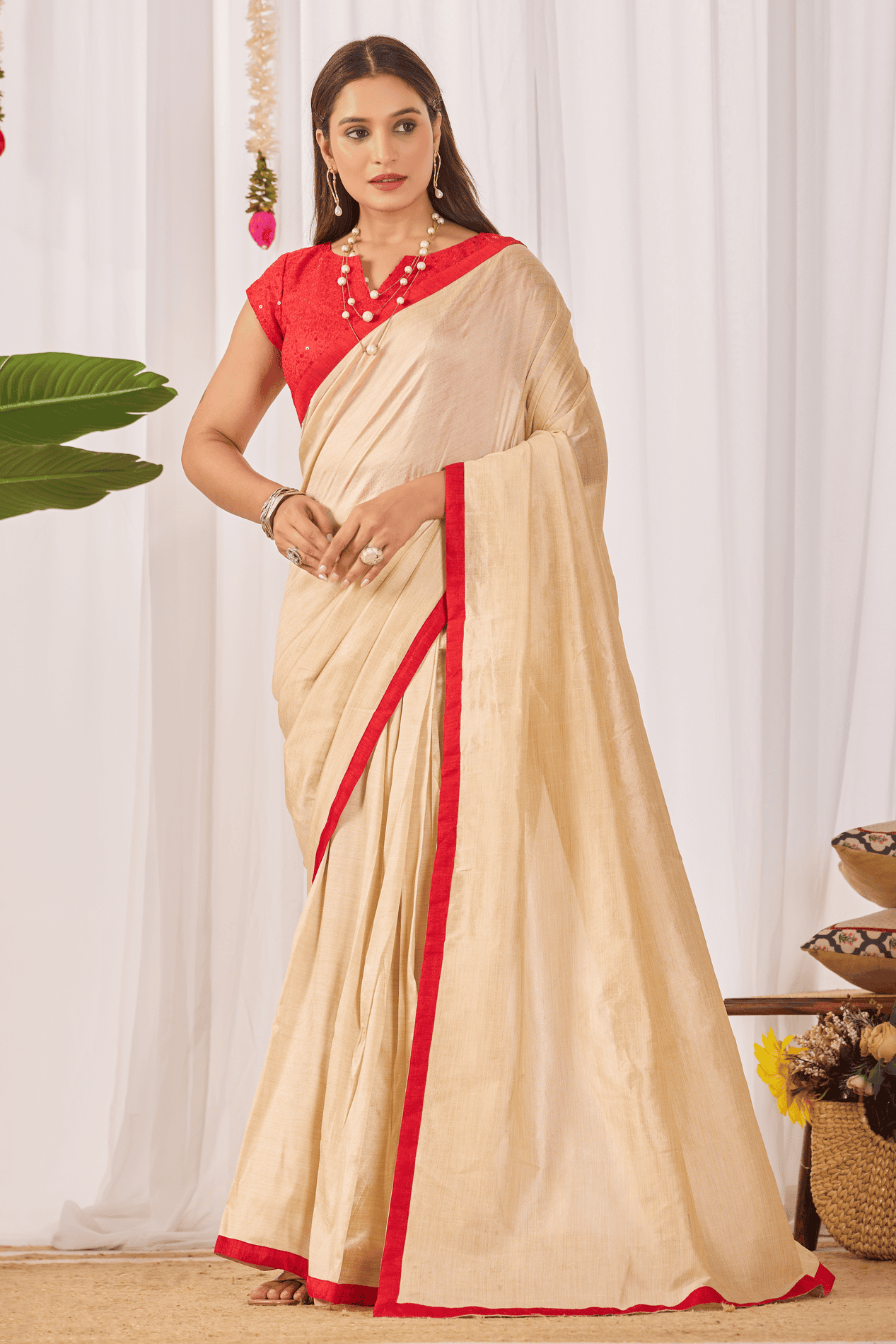 Champagne gold shimmer ready-to-wear saree with sequin border, embellished waist belt, and contrast red sequin blouse
